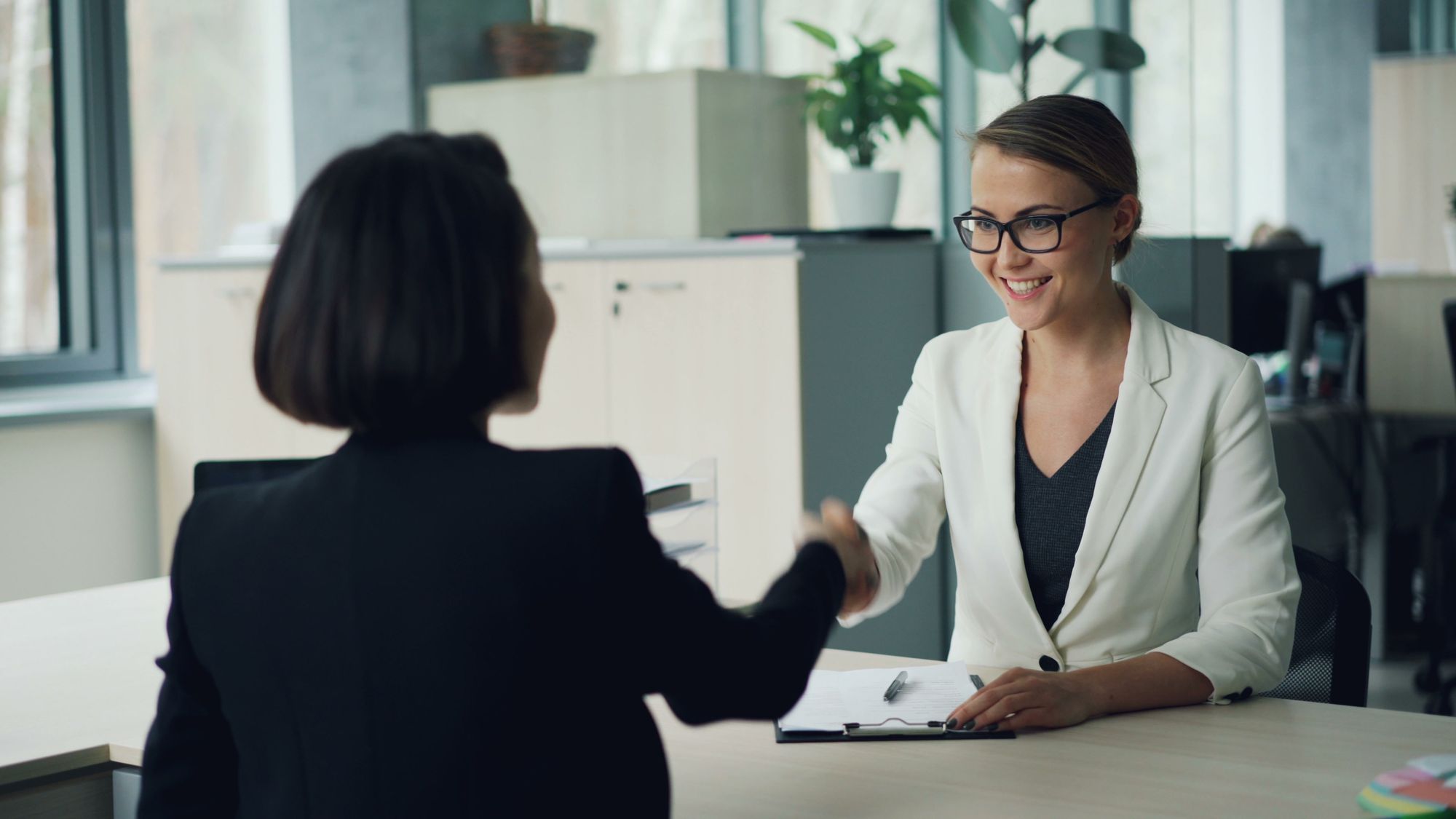 Business partnership handshake